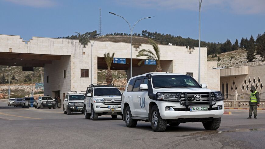 Vehicles carrying the first UN delegation to visit rebel-held northwestern Syria, arrive through the Bab al-Hawa border crossing with Turkey on February 14, 2023.