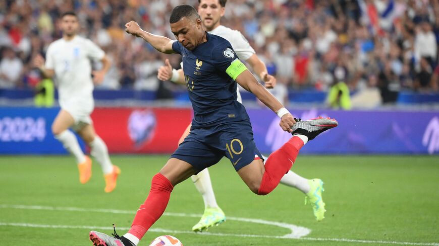 France's forward Kylian Mbappe kicks the ball during the UEFA Euro 2024 group B qualification football match between France and Greece at the Stade de France in Saint-Denis, in the northern outskirts of Paris, on June 19, 2023. (Photo by FRANCK FIFE / AFP) (Photo by FRANCK FIFE/AFP via Getty Images)