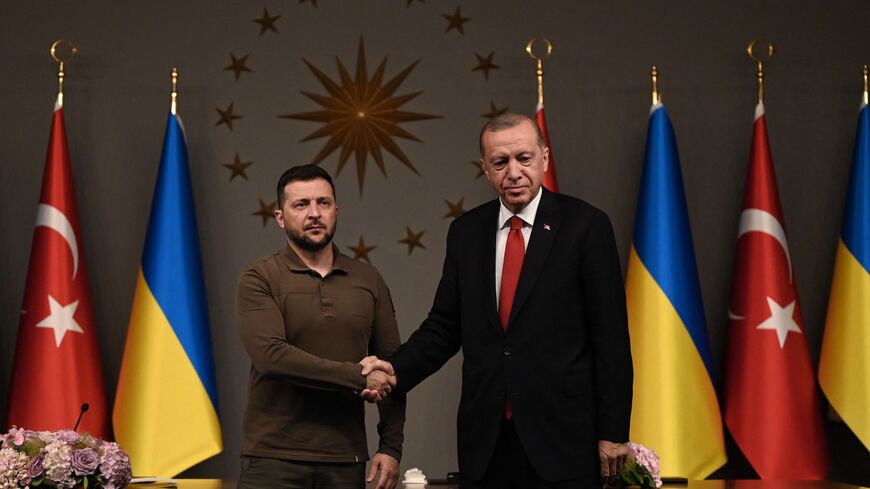 Turkish President Recep Tayyip Erdogan checks hands with Ukrainian President Volodymyr Zelensky after a joint press conference at the Vahdettin Mansion in Istanbul on July 7, 2023. (Photo by OZAN KOSE / AFP) (Photo by OZAN KOSE/AFP via Getty Images)