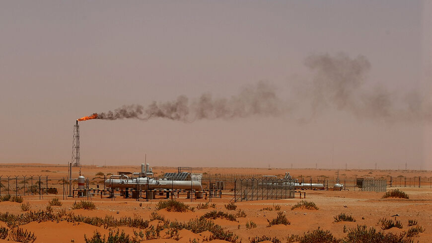 A flame from a Saudi Aramco oil installion known as "Pump 3" is seen in the desert near the oil-rich area of Khouris, 160 kms east of the Saudi capital Riyadh, on June 23, 2008. Oil producers are at war with speculators but they have been left speculating themselves over the future of their precious commodity after a unique summit, analysts said. Government ministers and traders alike are anxiously waiting to see which way prices go in coming weeks after Sunday's summit of consumers and producers, which Sau