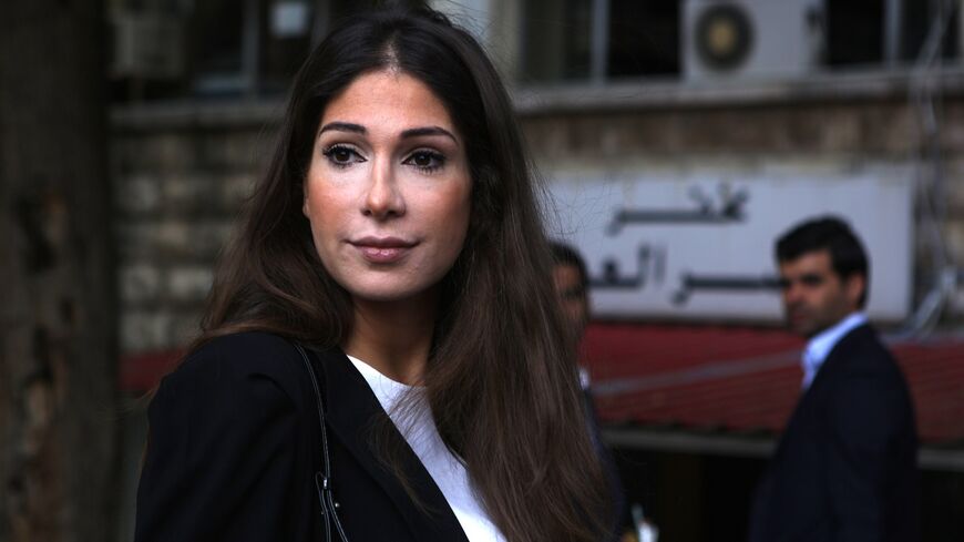 Lebanese TV station LBCIs anchorwoman Dima Sadek arrives at a Beirut court on November 4, 2015, as she appeared before a judge on the backdrop of a complaint filed by Hezbollah against her. The lawsuit was filed after Sadek hosted a TV episode on corruption, accusing Hezbollah of being involved in corrupt operations. AFP PHOTO / PATRICK BAZ (Photo credit should read PATRICK BAZ/AFP via Getty Images)