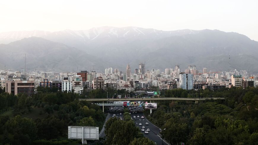 A picture taken on May 18, 2017 shows the skyline of northern Tehran from the "Nature" bridge in the capital Tehran on the eve of the presidential elections.