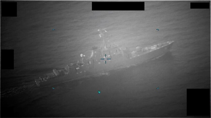 In an image released by US authorities, an Iranian naval vessel approaching the M/T Richmond Voyager to unlawfully seize the commercial tanker in the Gulf of Oman