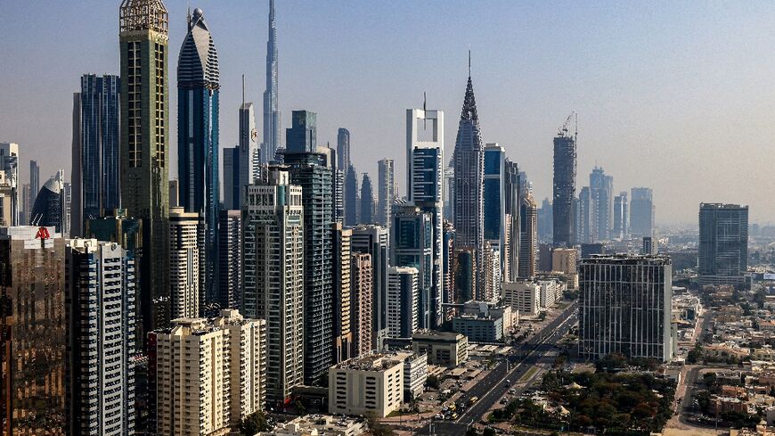 High-rises in Dubai: the UAE plans to triple renewable energy production and slash emissions