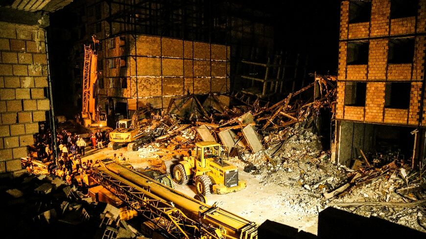 Iran's ISNA news agency said policemen were securing the planned demolition of 'unauthorised buildings' in Tehran when several of the structures collapsed