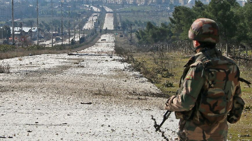 A Syrian army soldier on a road in the country's north in 2020