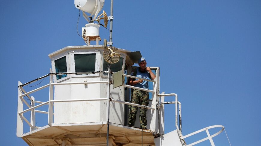 Keeping watch: a UN watchtower near the border fence
