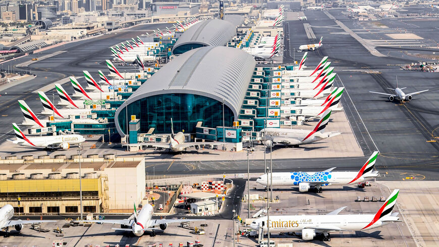 An aerial view shows Emirates aircraft parked on the tarmac at Dubai International Airport during a government-organized helicopter tour, July 8, 2020.
