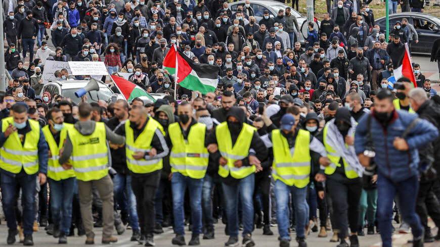 Arab Israelis demonstrate against organized crime and calling on the Israeli police to stop a wave of intra-communal violence, Umm al-Fahm, March 12, 2021. 