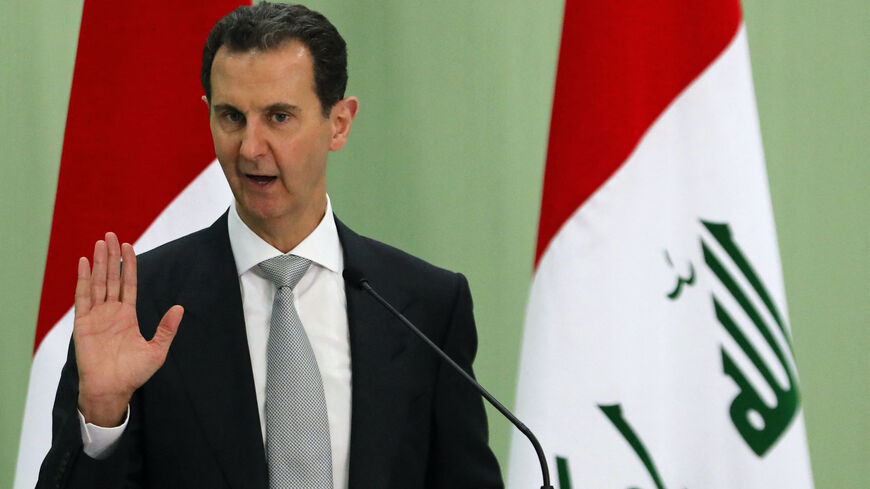 Syria's President Bashar al-Assad speaks during a press conference with Iraq's Prime Minister in Damascus on July 16, 2023.