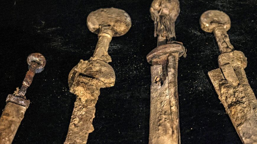 The weapons were well preserved with their iron blades, sheaths and handles still intact