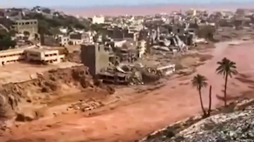 Libya's al-Masar television shows the flood-hit city of Derna on September 13 