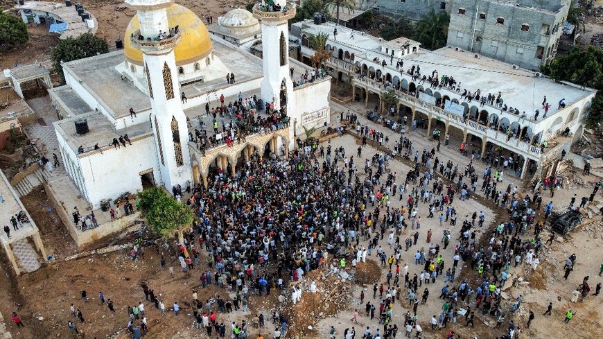 Protesters outside the Al-Sahaba mosque in Derna