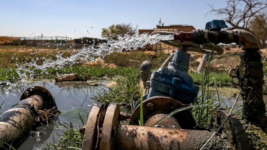 Water flows from irrigation pipes in the Palestinian village of al-Auja in the occupied West Bank