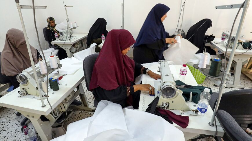 The apprentice dressmakers in Tripoli put their training on hold to help distressed survivors of the flash flood in Libya's east