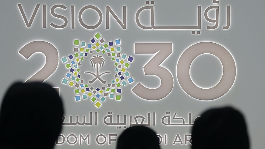 Saudi women stand next to the Saudi pavilion (vision 2030) at the Gitex 2018 exhibition at the Dubai World Trade Center in Dubai on October 16, 2018. - Gitex ("Gulf Information Technology Exhibition") is a consumer computer and electronics trade show. (Photo by KARIM SAHIB / AFP) (Photo credit should read KARIM SAHIB/AFP via Getty Images)