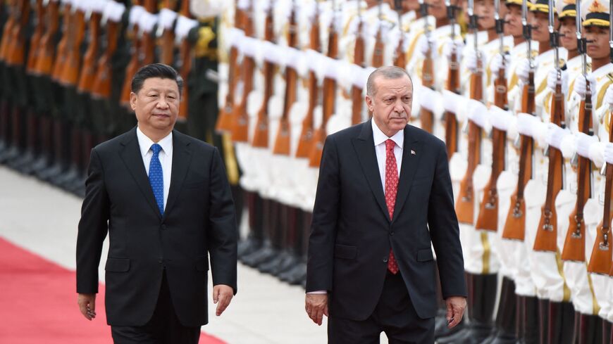 Turkish President Recep Tayyip Erdogan (R) and Chinese President Xi Jinping (L) inspect Chinese honour guards during a welcome ceremony outside the Great Hall of the People in Beijing on July 2, 2019. (Photo by WANG ZHAO / AFP) (Photo by WANG ZHAO/AFP via Getty Images)