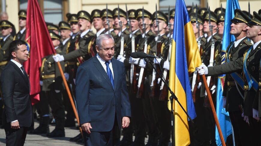 Ukrainian President Volodymyr Zelensky (L) and Israeli Prime Minister Benjamin Netanyahu (R) inspect the honour guard during a welcoming ceremony, in Ukrainian capital Kiev, on August 19, 2019, ahead of a meeting. - Benjamin Netanyahu is in a two-days official visit in Ukraine. (Photo by SERGEI SUPINSKY / AFP) (Photo credit should read SERGEI SUPINSKY/AFP via Getty Images)