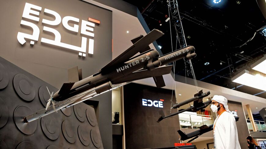 A visitor views a Hunter 2-S unmanned aerial systems "swarming drone" by EDGE, an advanced technology company for defense, at the UMEX Exhibition, Abu Dhabi National Exhibition Centre, February 22, 2022.