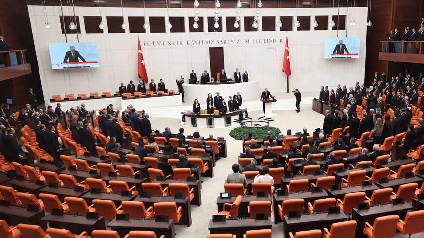 Turkish President Tayyip Erdogan (C) takes an oath of office after his election win at the parliament in Ankara on June 3, 2023. Turkey's Recep Tayyip Erdogan was sworn in for a third term as president on June 3, promising to serve "impartially" after winning a historic runoff election to extend his two-decade rule. (Photo by Adem ALTAN / AFP) (Photo by ADEM ALTAN/AFP via Getty Images)
