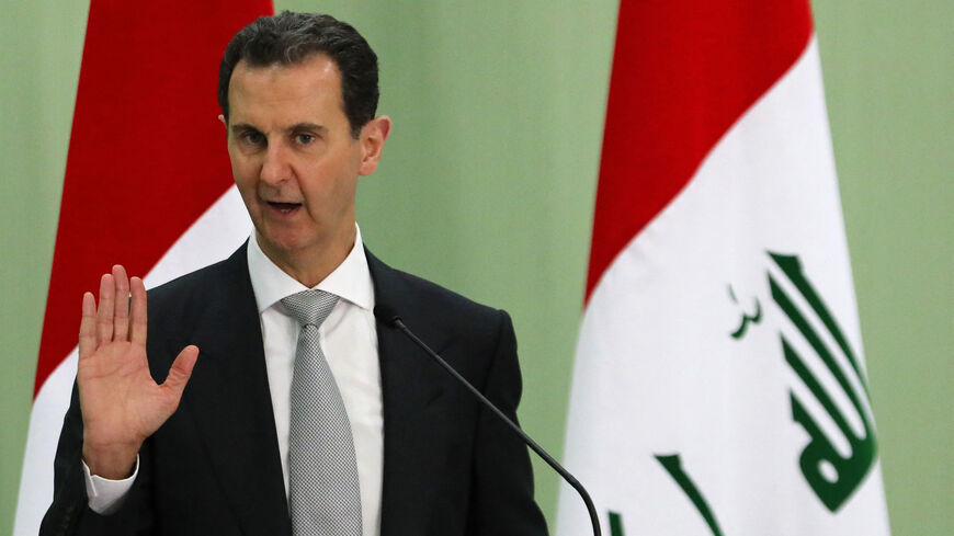 Syria's President Bashar al-Assad speaks during a press conference.