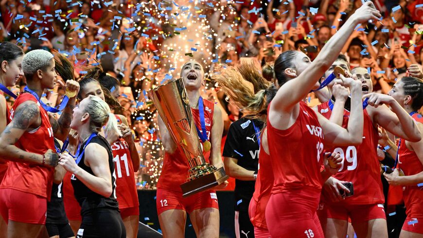 Turkey's team players celebrate their victory.