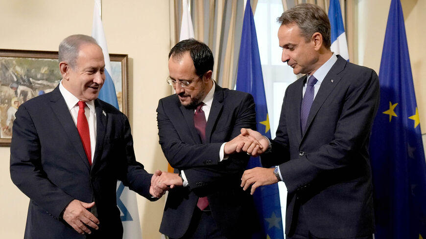 Cypriot President Nikos Christodoulides (C) holds a trilateral summit with Greek Prime Minister Kyriakos Mitsotakis (R) and Israeli Prime Minister Benjamin Netanyahu at the presidential palace in the Cypriot capital Nicosia, Sept. 4, 2023.