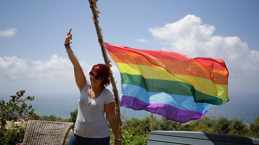 Members of Lebanon's LGBTQ community attend a picnic the coastal city of Batroun, north of Beirut, on May 21, 2017, as part of the Beirut Pride week aimed at raising awarness about the rights of the community. / AFP PHOTO / IBRAHIM CHALHOUB (Photo credit should read IBRAHIM CHALHOUB/AFP via Getty Images)