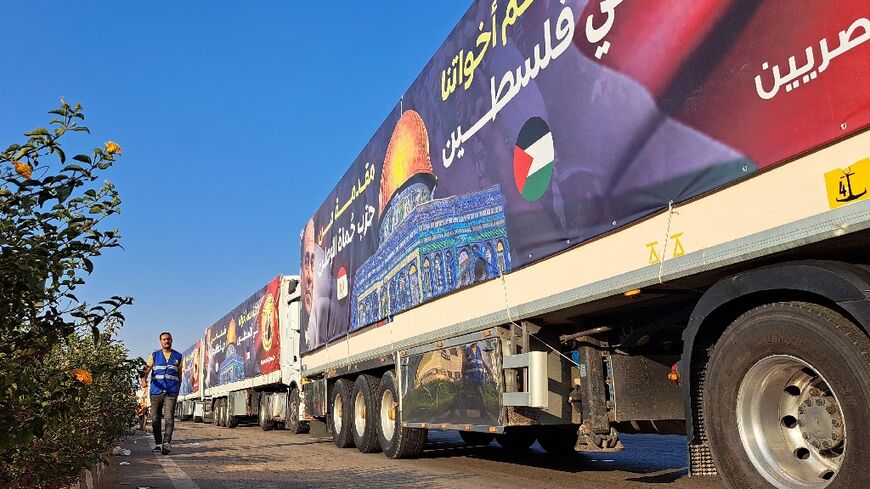 Trucks carrying humanitarian aid are waiting on the Egyptian side of the Rafah border