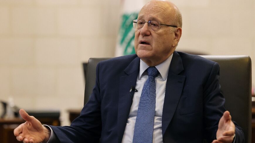 Lebanon's caretaker prime minister Najib Mikati speaks during an interview with AFP