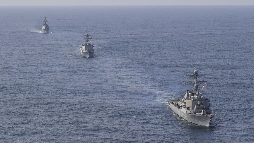 In this handout image released by the South Korean Defense Ministry, South Korean Navy's destroyer Yulgok Yi I (C), U.S. Navy's USS Benfold (R) and Japan Maritime Self-Defense Force's JS Atago (L) sail in formation during a joint naval exercise in international waters on April 17, 2023 at an undisclosed location. South Korea, the United States and Japan held a trilateral missile defense exercise in the international waters on Monday, Seoul's Navy said, amid stepped-up efforts to sharpen deterrence against N