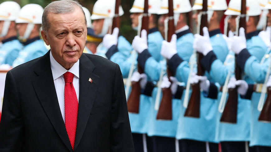 Turkish President Recep Tayyip Erdogan is welcomed by an honor guard ahead of the opening of the Turkish Grand National Assembly in Ankara, Oct. 1, 2023.     