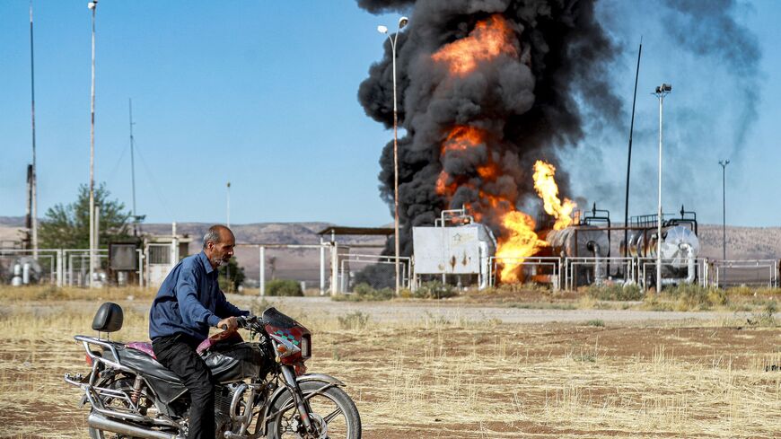 - A man prepares to ride a motorcycle close to a fire raging at the Zarba oil facility in al-Qahtaniyah in northeastern Syria close to the Turkish border on October 5, 2023. Turkish strikes on October 5 on the Kurdish-controlled region of Hasakeh in northeastern Syria hit a car, killing two people, the Syrian Observatory for Human Rights said, after Ankara had threatened raids in retaliation for a bomb attack. In another strike, "Turkish drones targeted a factory north of Hasakeh, injuring three workers", s