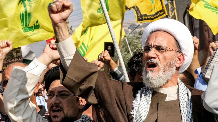 Shiite Muslim clerics chant slogans during an anti-Israel rally in solidarity with the Palestinian people organised by supporters of the Lebanese Shiite movement Hezbollah in Lebanon's southern city of Nabatieh on October 13, 2023. Thousands of people, both Israeli and Palestinians have died since October 7, 2023, after Palestinian Hamas militants entered Israel in a surprise attack leading Israel to declare war on Hamas in the Gaza Strip on October 8. (Photo by MAHMOUD ZAYYAT / AFP) (Photo by MAHMOUD ZAYYA