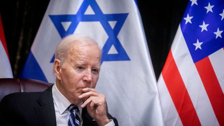 US President Joe Biden joins Israel's Prime Minister for the start of the Israeli war cabinet meeting, in Tel Aviv on October 18, 2023.