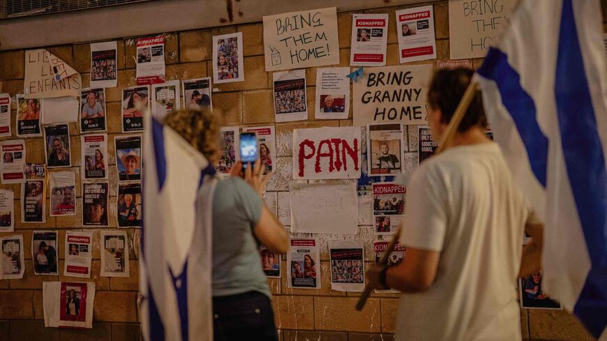 Families and friends of Israelis held hostage by Hamas in Gaza gathered at "Hostages Square" outside the Art Museum of Tel Aviv.