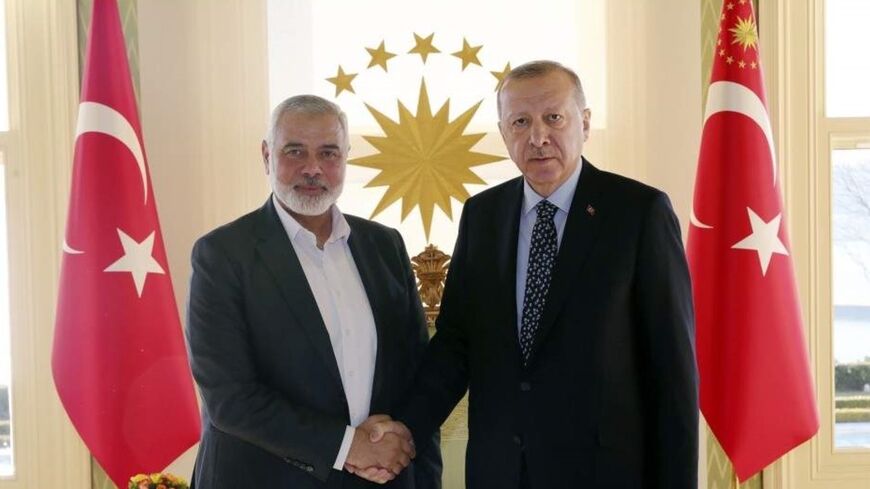 Turkish President Recep Tayyip Erdogan with Hamas political leader Ismael Hanniyeh in Istanbul in February 1, 2023
