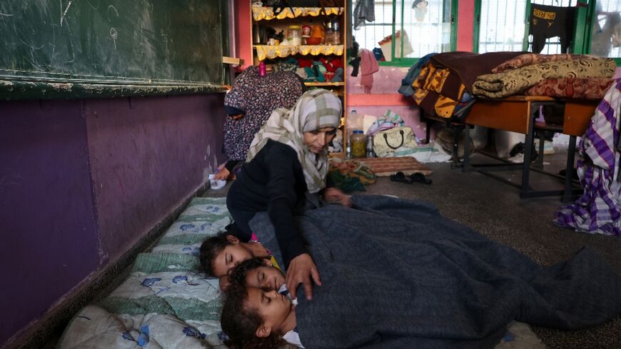 Palestinians sought refuge after Israel warned them to evacuate the northern Gaza Strip before an expected ground offensive against Hamas, one week after the deadliest attack in Israel's history