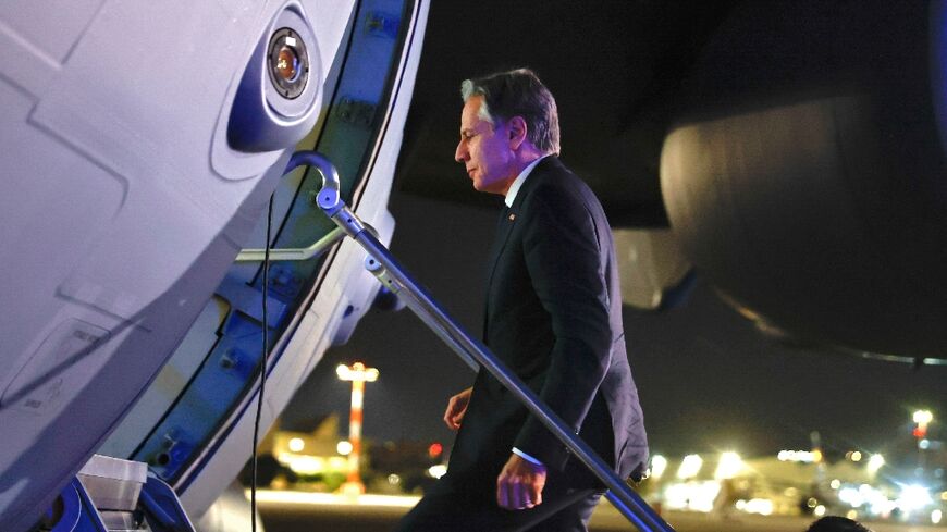 US Secretary of State Antony Blinken boards an aircraft as he departs Israel from Tel Aviv en route to Jordan, amid the ongoing conflict between Israel and the Palestinian Islamist group Hamas on November 3, 2023