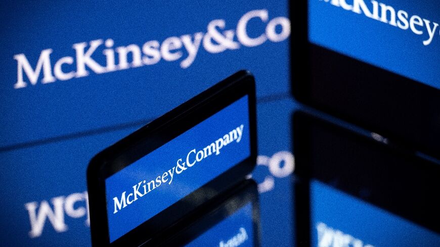 Screens displaying the logo of US-based McKinsey & Company, the world's top management consulting firm