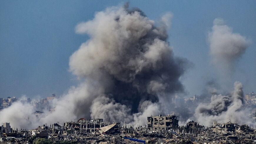 Smoke billows after an Israeli strike in north Gaza on November 22, 2023