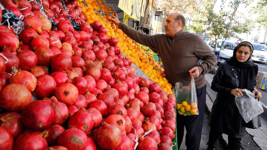 Iranians shop for fruits at a market in Tehran on November 21, 2019. (Photo by STR / AFP) (Photo by STR/afp/AFP via Getty Images)