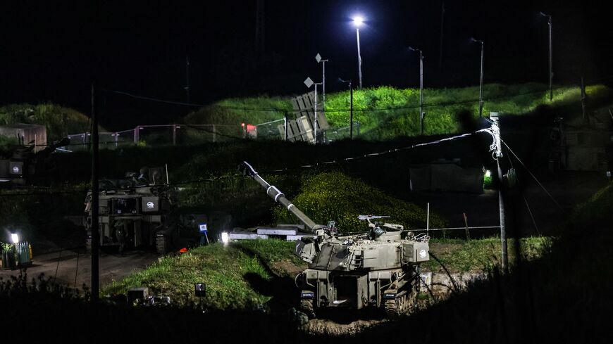 Israeli self-propelled artillery howitzers are stationed at an Israeli army base in Zawra, the Israeli-annexed Golan Heights, April 6, 2023.