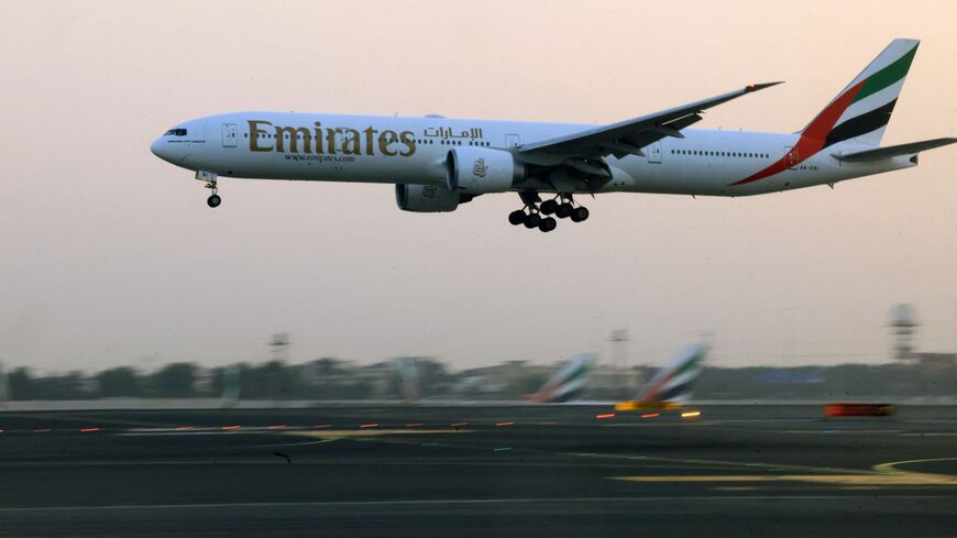 An Emirates Airlines plane lands at Dubai International Airport in Dubai on Oct. 17, 2023. 