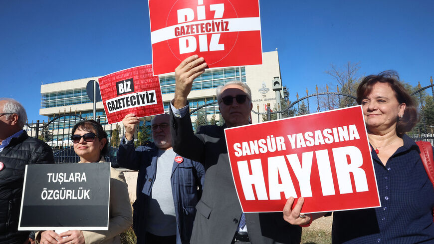 Journalists carrying placards "No to the censorship law" and "We are journalists" take part in a protest in front of the Constitutional Court in Ankara on Nov. 8, 2023, regarding the law discussed by the Constitutional Court and known to the public as the Censorship Law.
