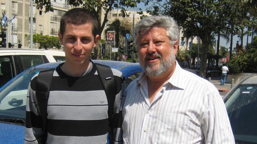Former Israeli soldier Gilad Shalit (R) and Israeli peace activist and hostage negotiator Gershon Baskin. 