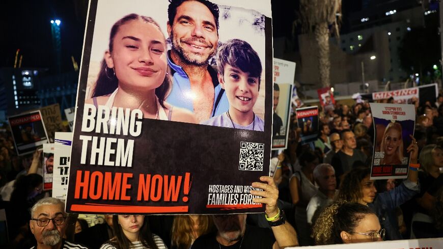 Protesters rally in Tel Aviv on November 18, 2023 to demand the release of Israelis held hostage in Gaza since the October 7 attack by Hamas militants