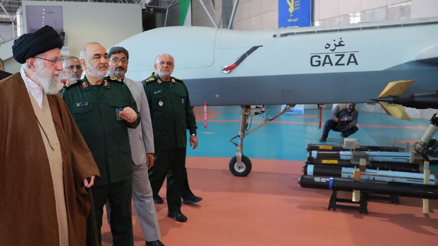 Iran's Supreme Leader Ayatollah Ali Khamenei (L) during a visit to a Revolutionary Guards centre in Tehran