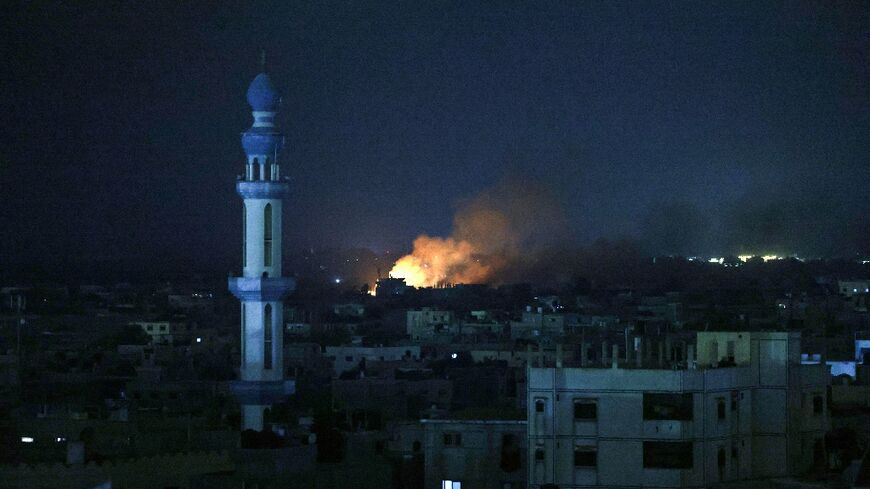 A fire burns following Israeli air strikes in Rafah in the southern Gaza Strip