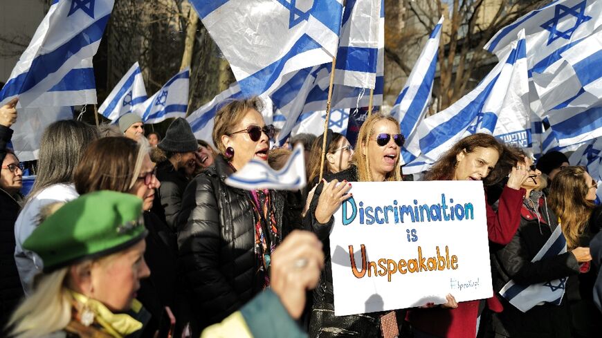 Under the slogan 'Me too, unless you're a Jew', the protesters chanted 'shame on UN', sported banners reading 'rape is rape'